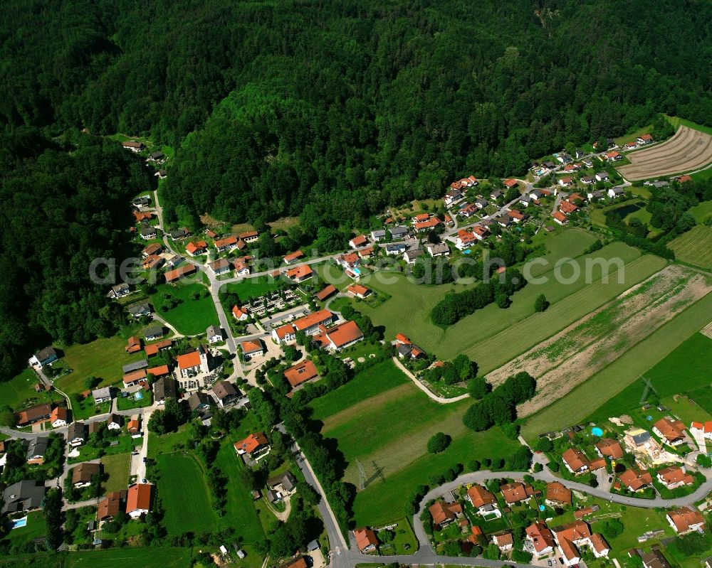 Aerial photograph Julbach - Agricultural land and field boundaries surround the settlement area of the village in Julbach in the state Bavaria, Germany