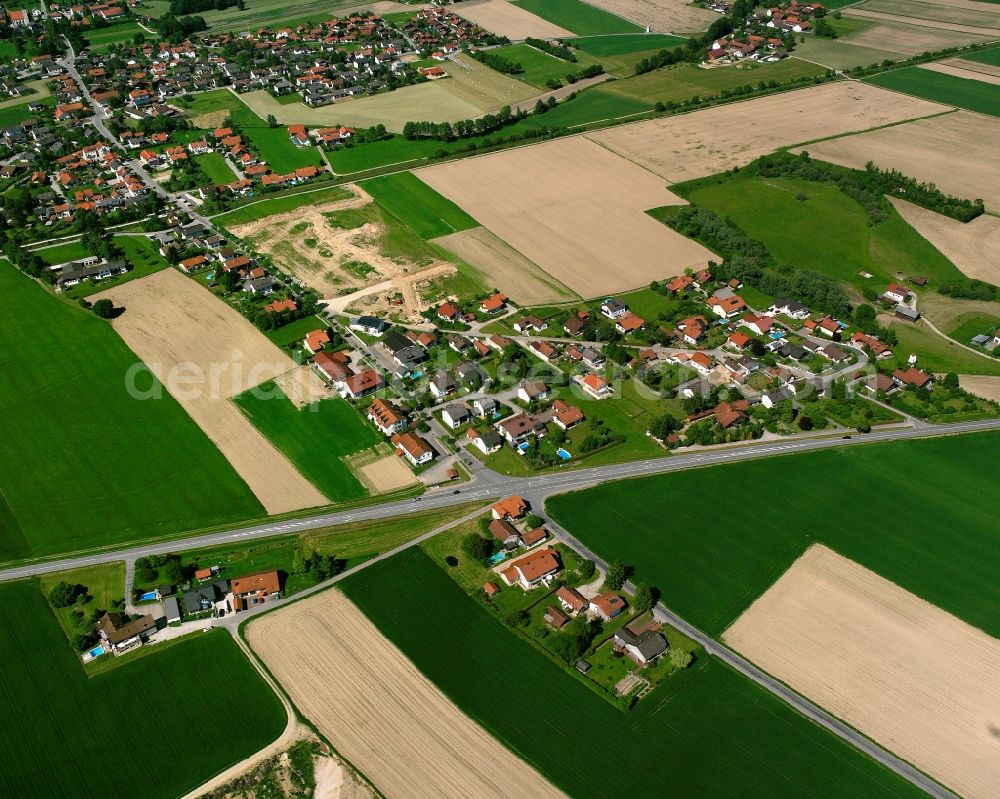 Aerial image Julbach - Agricultural land and field boundaries surround the settlement area of the village in Julbach in the state Bavaria, Germany