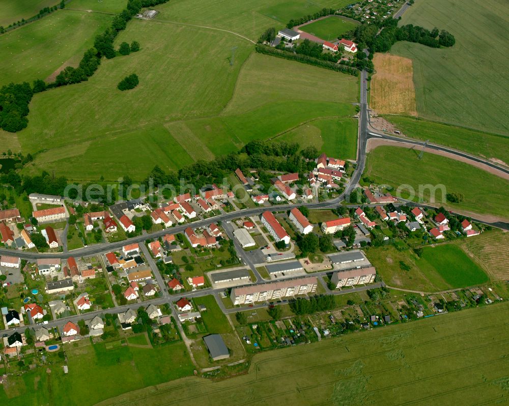 Kalkreuth from above - Agricultural land and field boundaries surround the settlement area of the village in Kalkreuth in the state Saxony, Germany