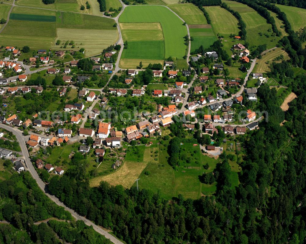 Kapfenhardt from above - Agricultural land and field boundaries surround the settlement area of the village in Kapfenhardt in the state Baden-Wuerttemberg, Germany