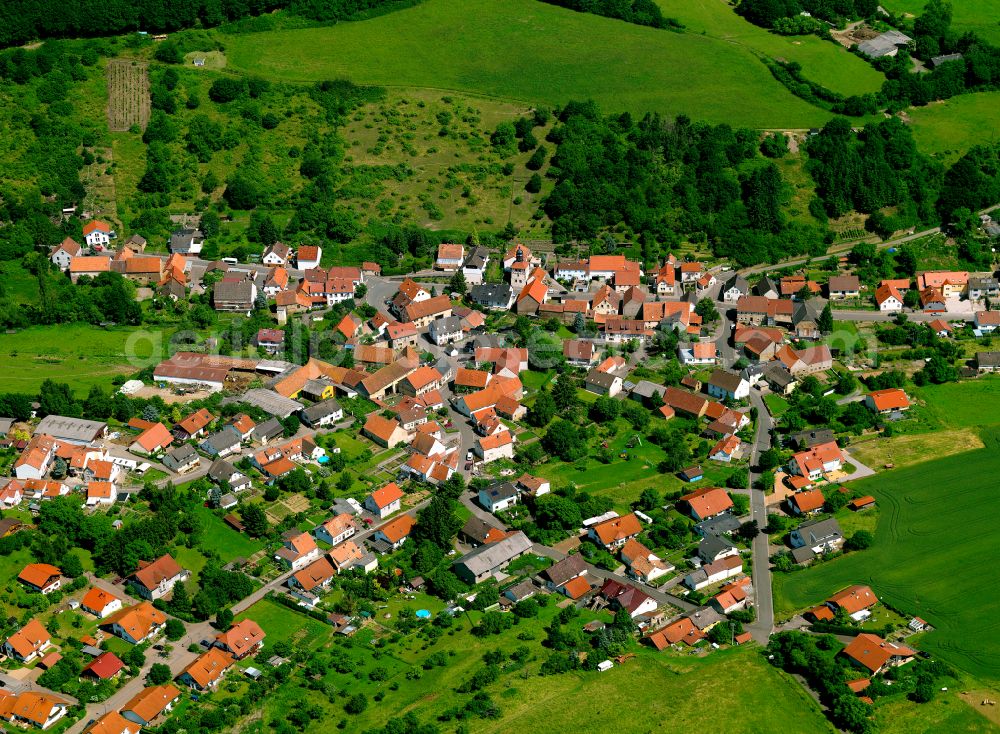 Aerial image Katzenbach - Agricultural land and field boundaries surround the settlement area of the village in Katzenbach in the state Rhineland-Palatinate, Germany