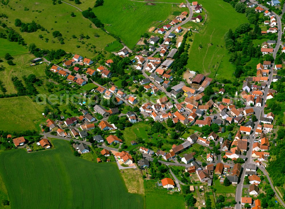 Aerial image Katzenbach - Agricultural land and field boundaries surround the settlement area of the village in Katzenbach in the state Rhineland-Palatinate, Germany