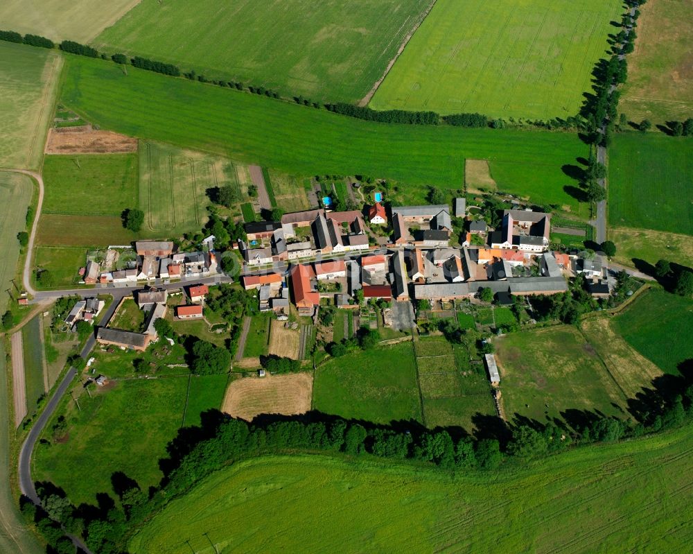 Aerial image Kerchau - Agricultural land and field boundaries surround the settlement area of the village in Kerchau in the state Saxony-Anhalt, Germany