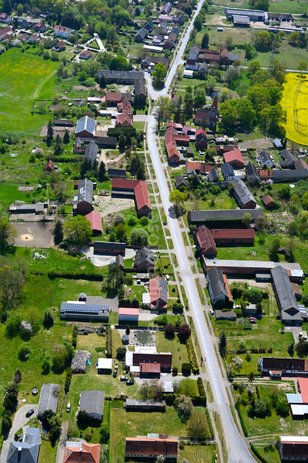 Aerial photograph Kerkau - Agricultural land and field boundaries surround the settlement area of the village in Kerkau in the state Saxony-Anhalt, Germany