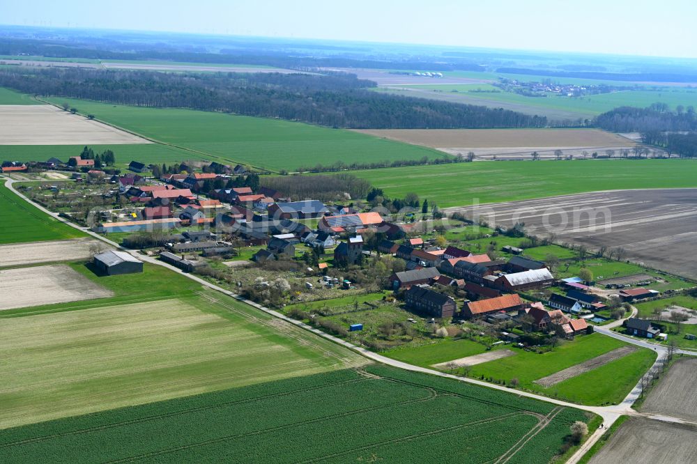 Aerial photograph Kerkuhn - Agricultural land and field boundaries surround the settlement area of the village in Kerkuhn in the state Saxony-Anhalt, Germany