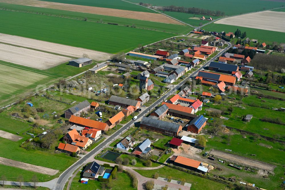 Aerial photograph Kerkuhn - Agricultural land and field boundaries surround the settlement area of the village in Kerkuhn in the state Saxony-Anhalt, Germany