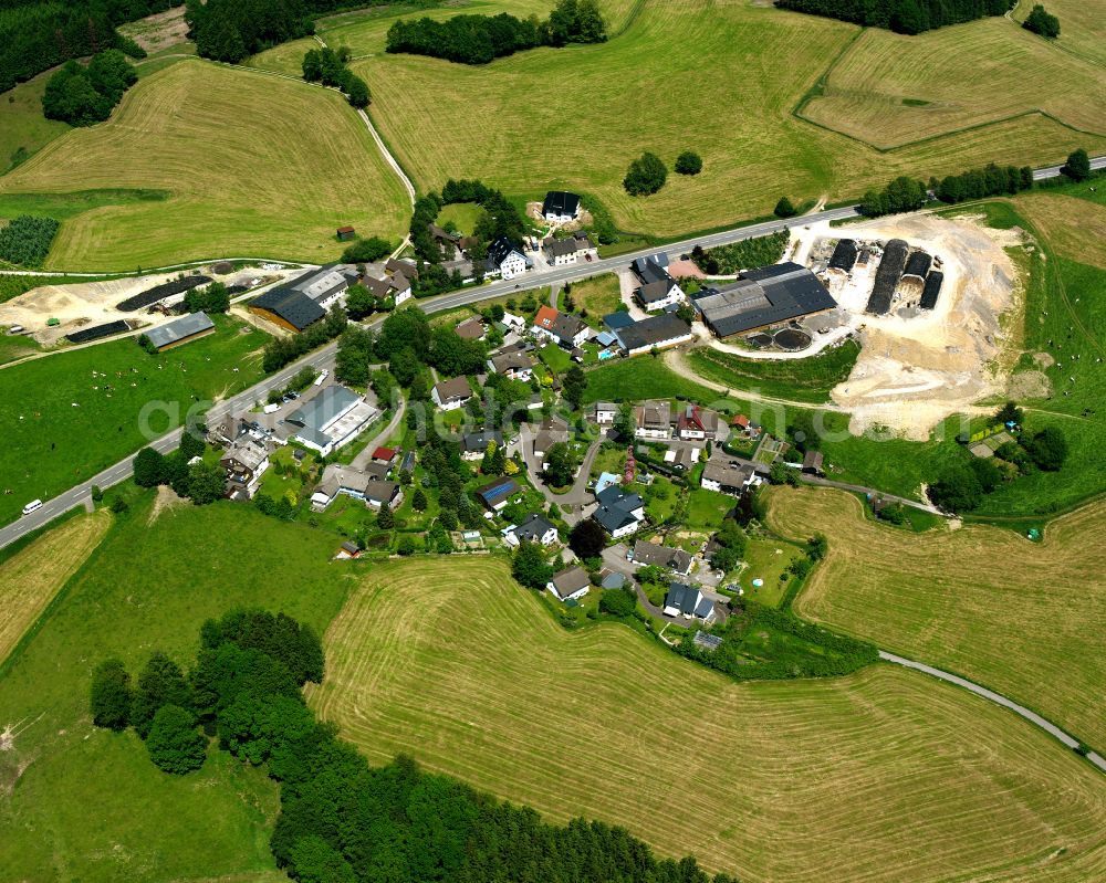 Aerial photograph Kiersperhagen - Agricultural land and field boundaries surround the settlement area of the village in Kiersperhagen in the state North Rhine-Westphalia, Germany