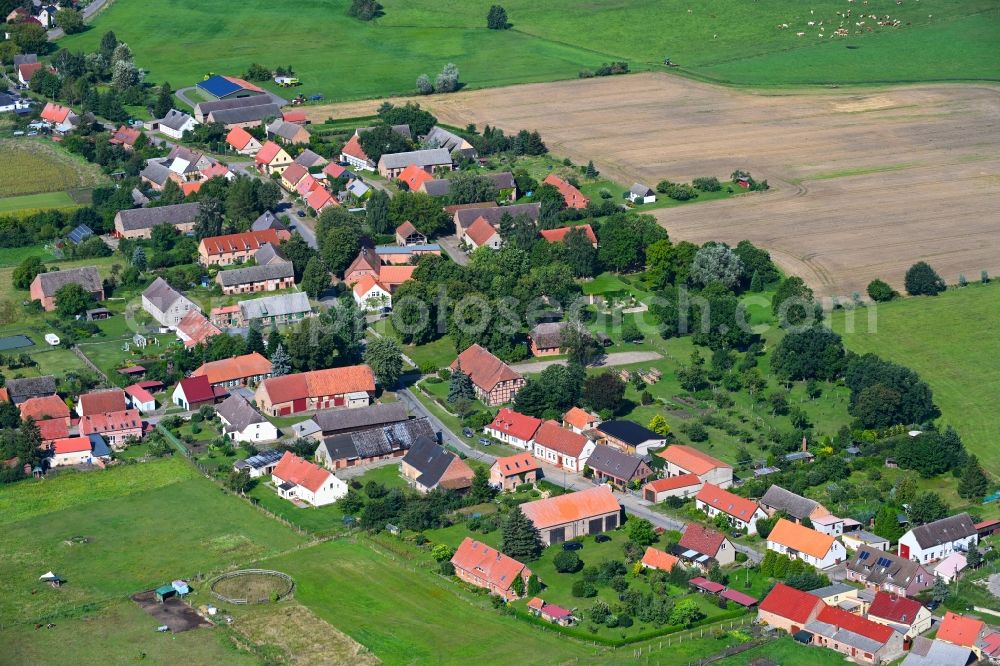 Aerial image Kieve - Agricultural land and field boundaries surround the settlement area of the village in Kieve in the state Mecklenburg - Western Pomerania, Germany