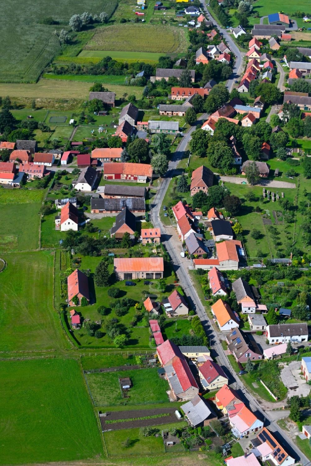 Aerial photograph Kieve - Agricultural land and field boundaries surround the settlement area of the village in Kieve in the state Mecklenburg - Western Pomerania, Germany