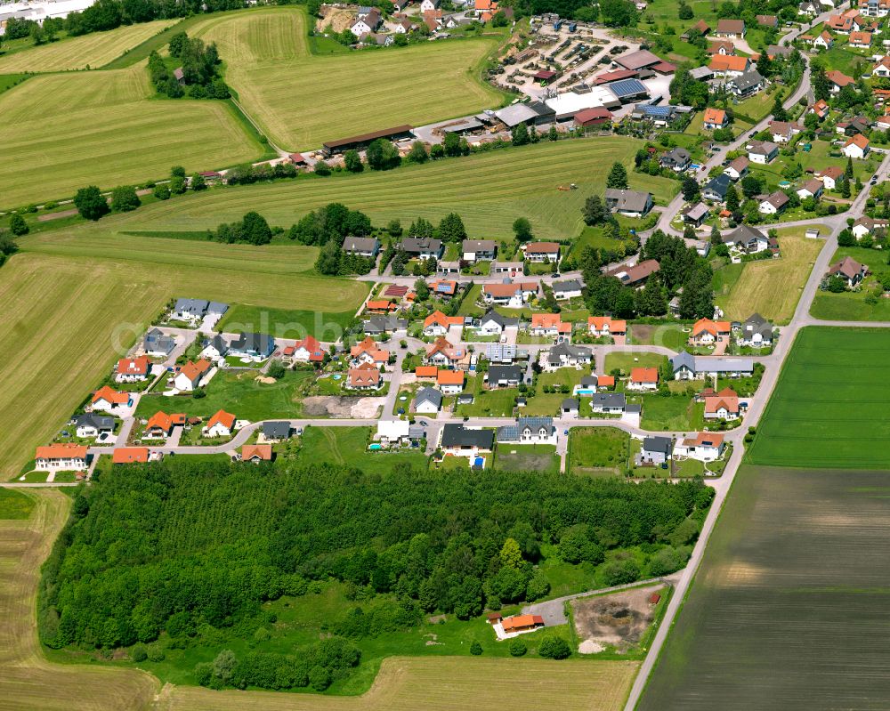 Kirchberg from the bird's eye view: Agricultural land and field boundaries surround the settlement area of the village in Kirchberg in the state Baden-Wuerttemberg, Germany