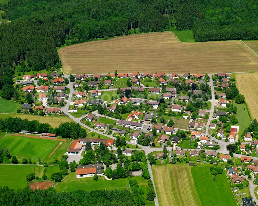 Aerial image Kirchberg - Agricultural land and field boundaries surround the settlement area of the village in Kirchberg in the state Baden-Wuerttemberg, Germany