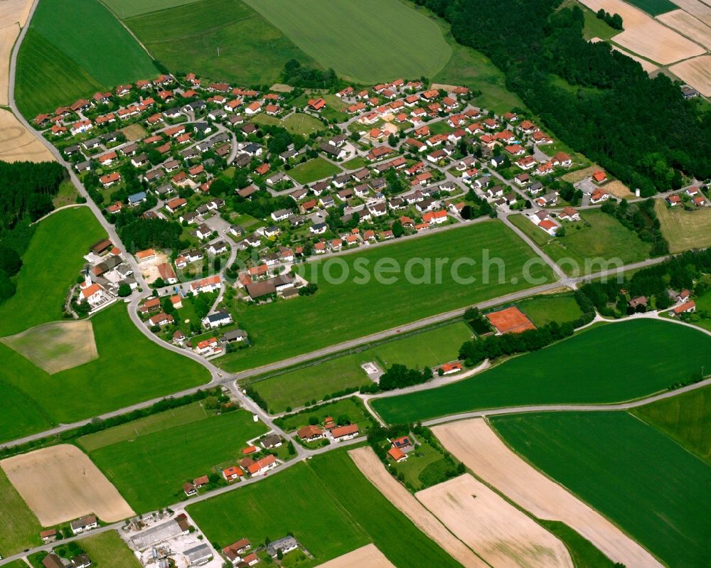 Aerial photograph Kirchberg - Agricultural land and field boundaries surround the settlement area of the village in Kirchberg in the state Bavaria, Germany