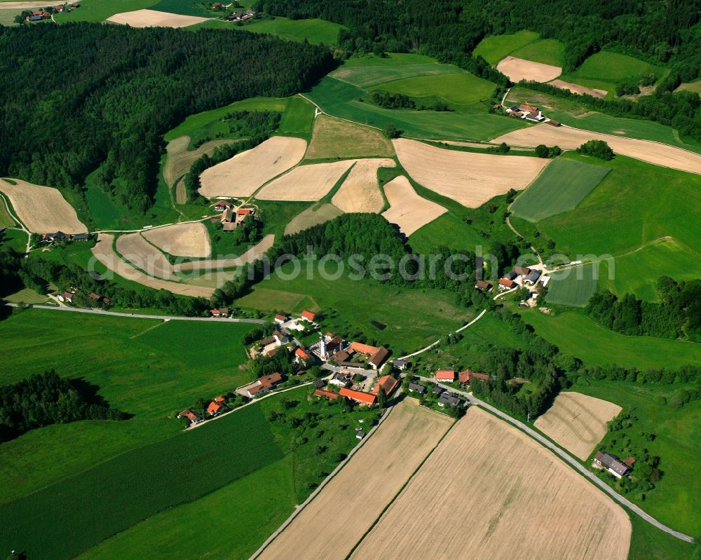 Aerial image Kirn - Agricultural land and field boundaries surround the settlement area of the village in Kirn in the state Bavaria, Germany