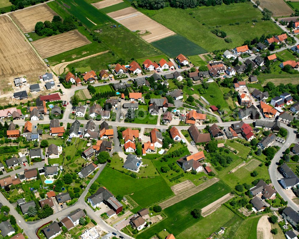 Kittersburg from above - Agricultural land and field boundaries surround the settlement area of the village in Kittersburg in the state Baden-Wuerttemberg, Germany