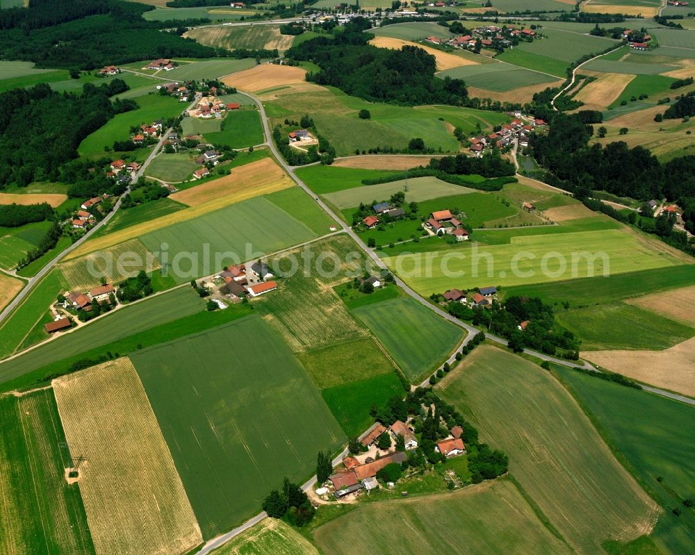 Kleinlintach from above - Agricultural land and field boundaries surround the settlement area of the village in Kleinlintach in the state Bavaria, Germany