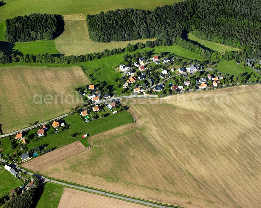 Aerial image Kleinmilkau - Agricultural land and field boundaries surround the settlement area of the village in Kleinmilkau in the state Saxony, Germany