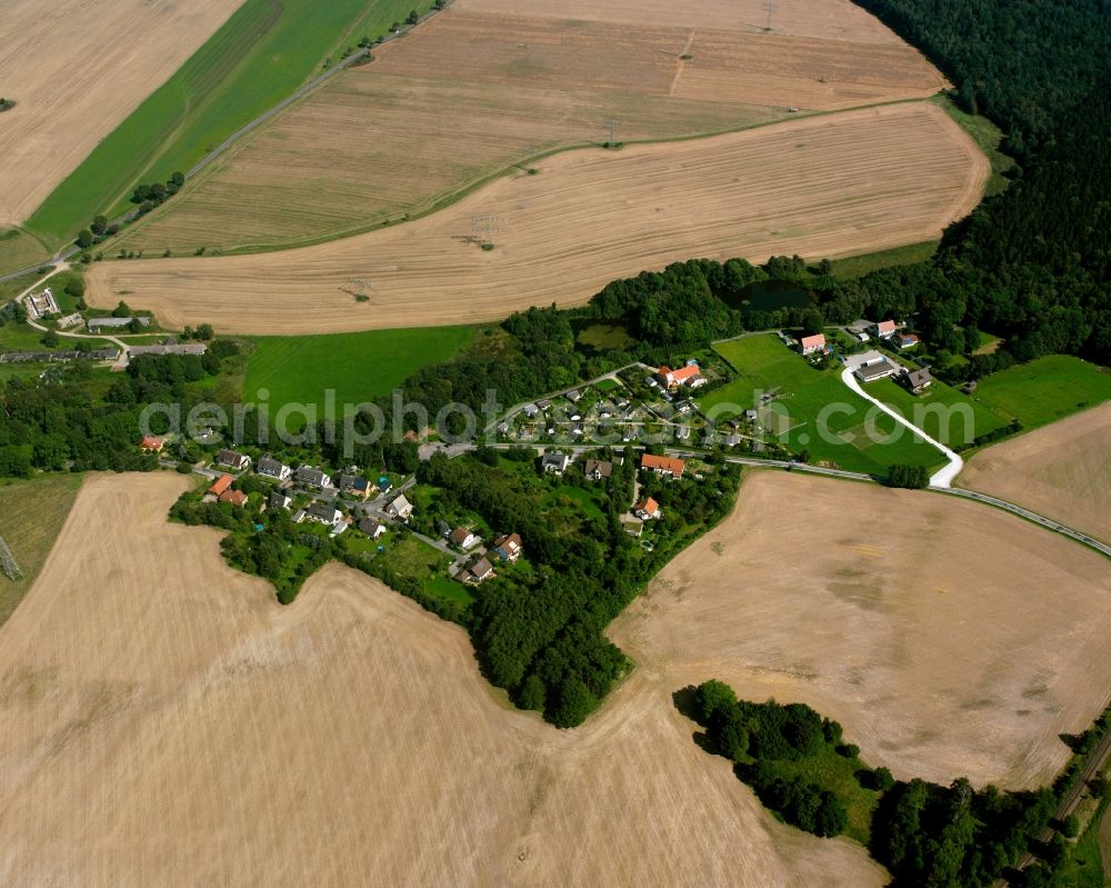 Aerial image Kleinwaltersdorf - Agricultural land and field boundaries surround the settlement area of the village in Kleinwaltersdorf in the state Saxony, Germany