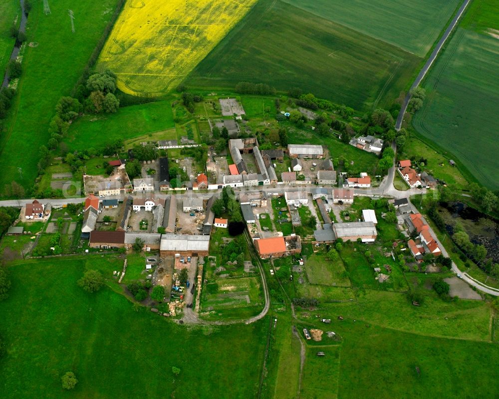 Aerial photograph Kämeritz - Agricultural land and field boundaries surround the settlement area of the village in Kämeritz in the state Saxony-Anhalt, Germany