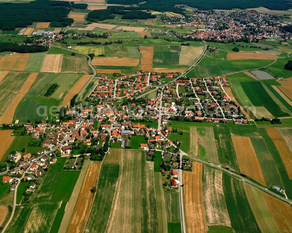 Aerial image Königshofen a.d.Heide - Agricultural land and field boundaries surround the settlement area of the village in Königshofen a.d.Heide in the state Bavaria, Germany