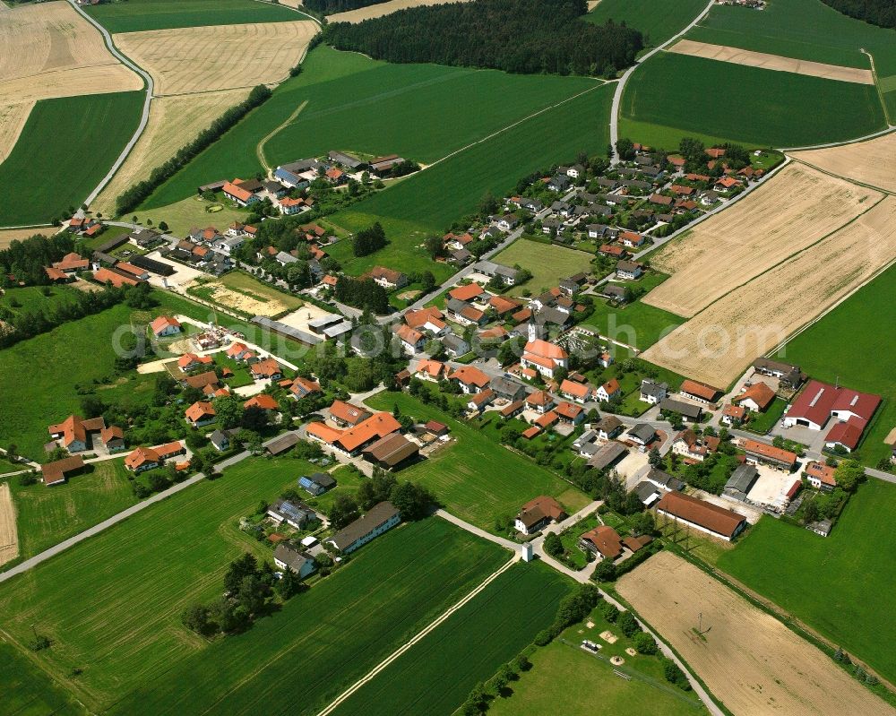 Kollbach from the bird's eye view: Agricultural land and field boundaries surround the settlement area of the village in Kollbach in the state Bavaria, Germany