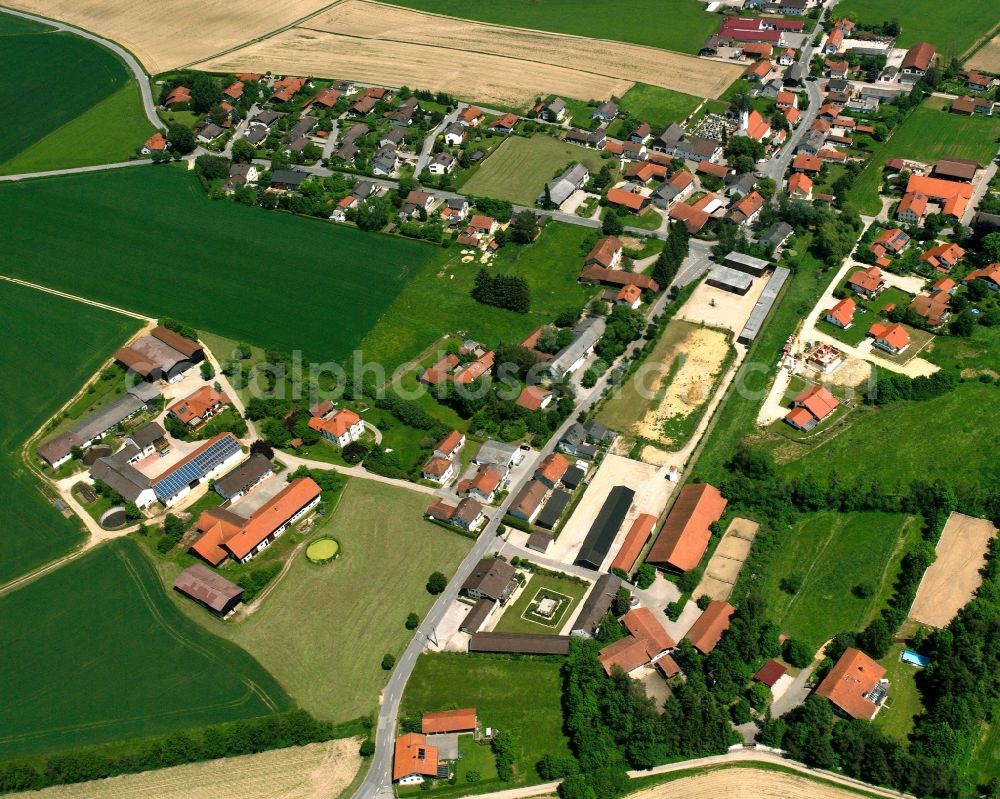 Kollbach from above - Agricultural land and field boundaries surround the settlement area of the village in Kollbach in the state Bavaria, Germany