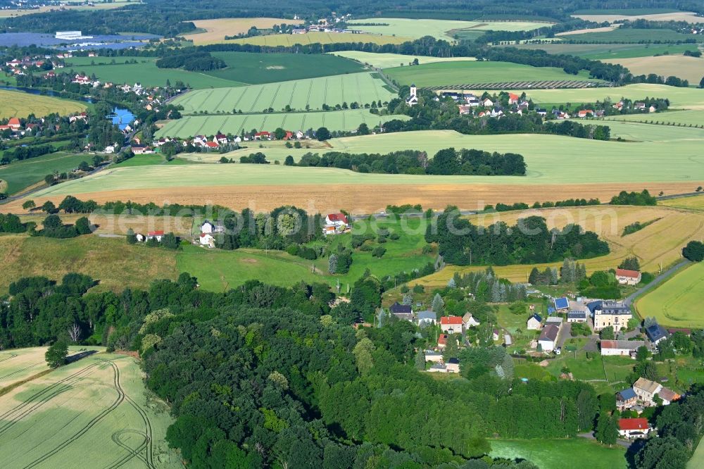 Korpitzsch from above - Agricultural land and field boundaries surround the settlement area of the village in Korpitzsch in the state Saxony, Germany