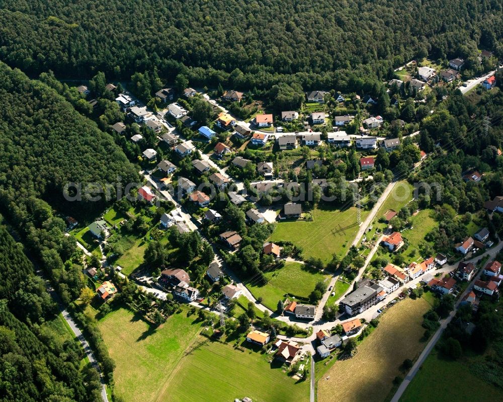 Kortelshütte from the bird's eye view: Agricultural land and field boundaries surround the settlement area of the village in Kortelshütte in the state Hesse, Germany