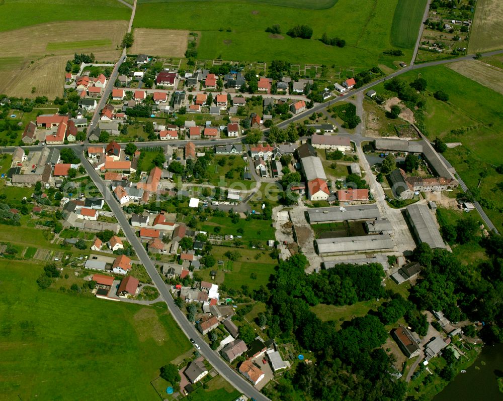 Aerial image Koselitz - Agricultural land and field boundaries surround the settlement area of the village in Koselitz in the state Saxony, Germany