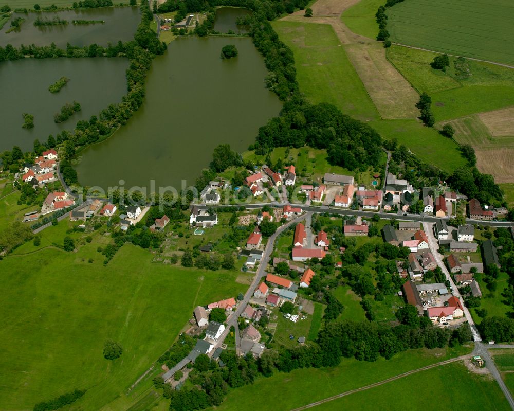 Aerial photograph Koselitz - Agricultural land and field boundaries surround the settlement area of the village in Koselitz in the state Saxony, Germany