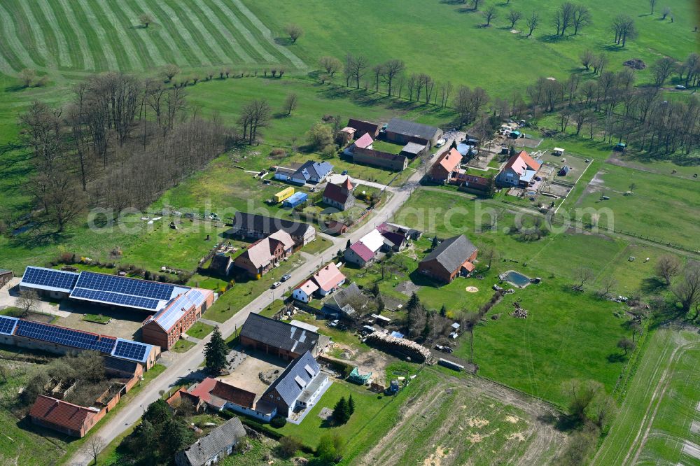 Kraatz from above - Agricultural land and field boundaries surround the settlement area of the village in Kraatz in the state Saxony-Anhalt, Germany