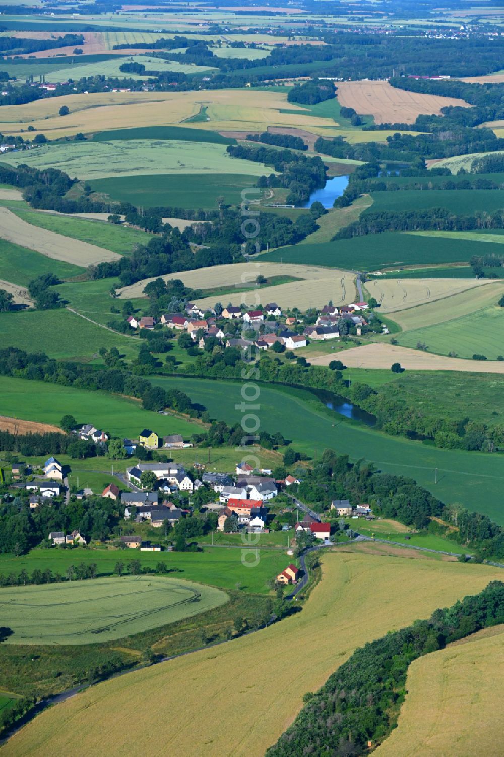 Aerial photograph Kralapp - Agricultural land and field boundaries surround the settlement area of the village in Kralapp in the state Saxony, Germany