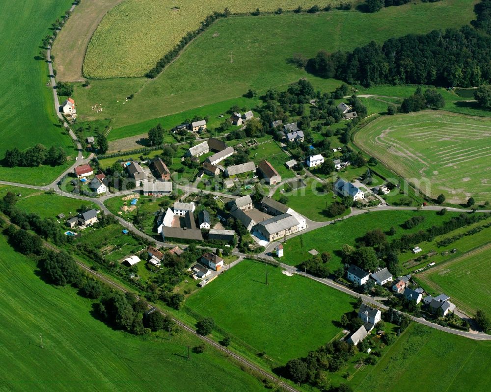 Kralapp from above - Agricultural land and field boundaries surround the settlement area of the village in Kralapp in the state Saxony, Germany