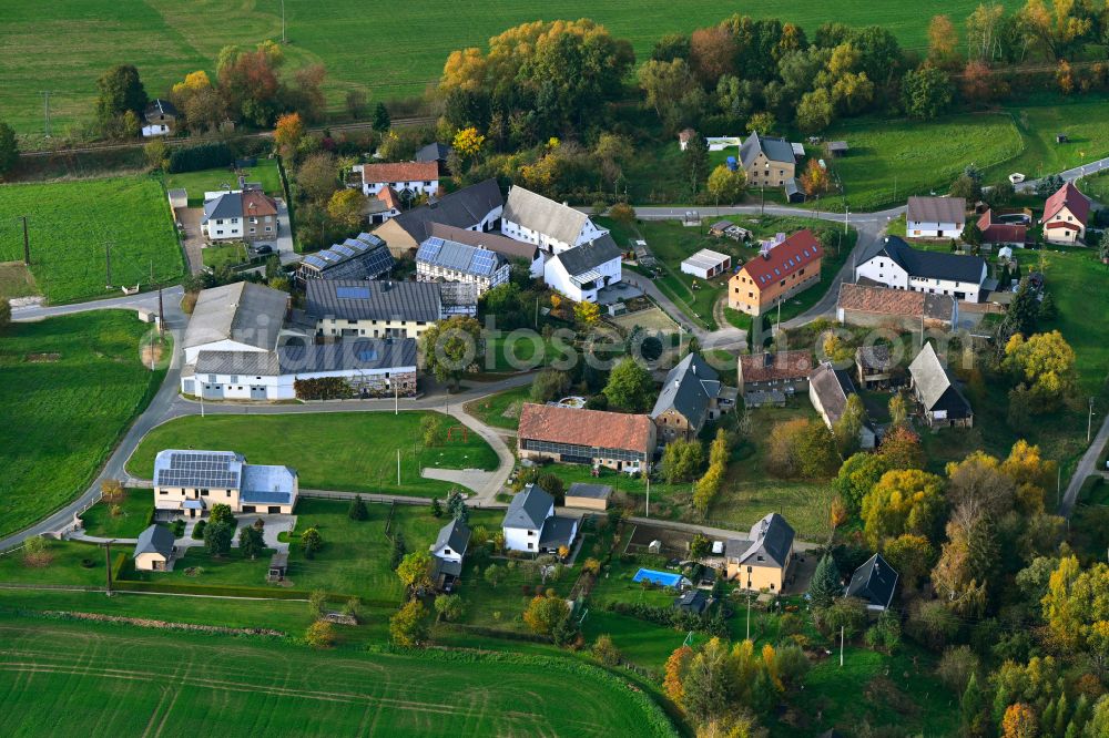 Kralapp from above - Agricultural land and field boundaries surround the settlement area of the village in Kralapp in the state Saxony, Germany