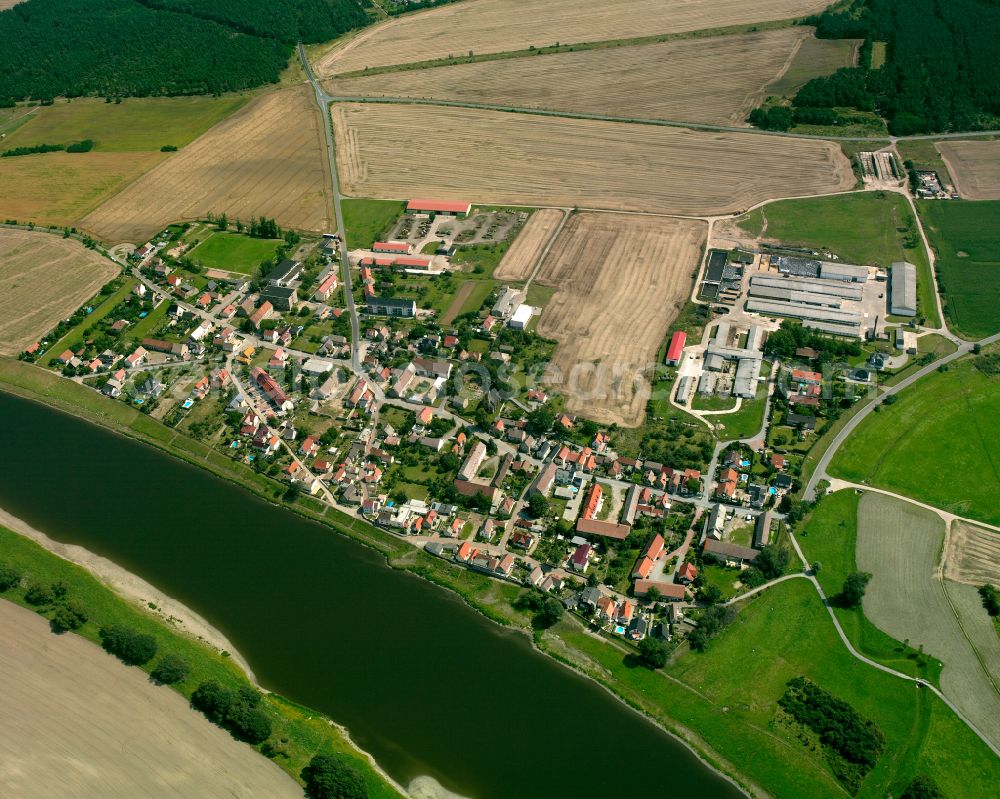 Aerial image Kreinitz - Agricultural land and field boundaries surround the settlement area of the village in Kreinitz in the state Saxony, Germany