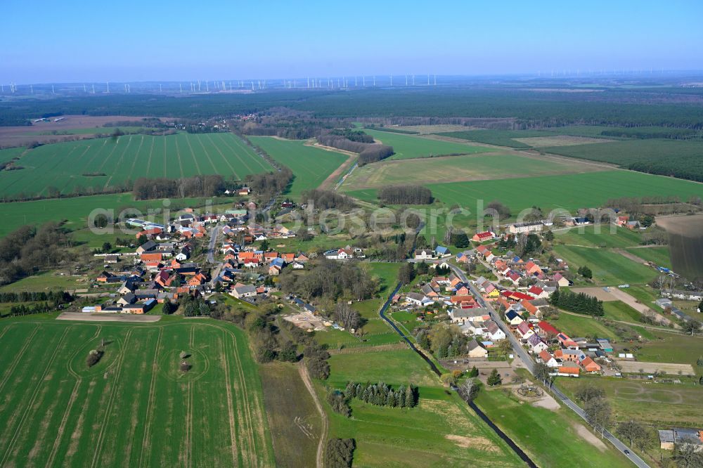 Krempendorf from above - Agricultural land and field boundaries surround the settlement area of the village in Krempendorf in the state Brandenburg, Germany