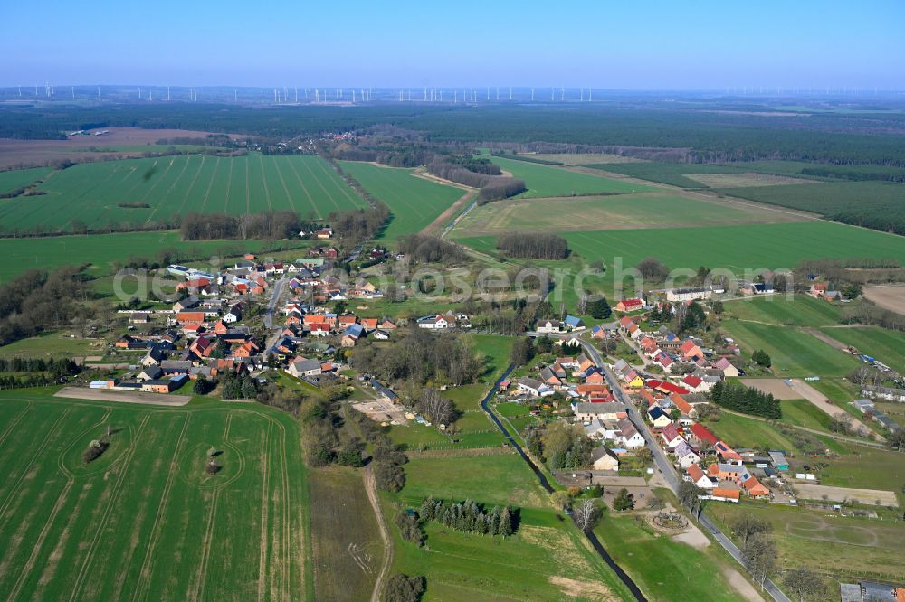 Krempendorf from the bird's eye view: Agricultural land and field boundaries surround the settlement area of the village in Krempendorf in the state Brandenburg, Germany