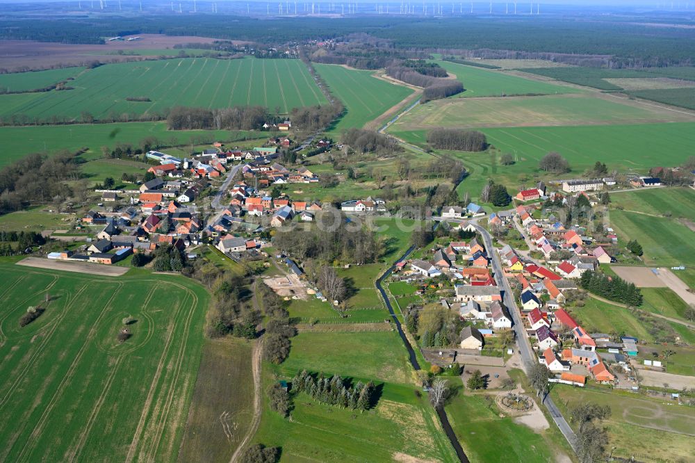 Aerial image Krempendorf - Agricultural land and field boundaries surround the settlement area of the village in Krempendorf in the state Brandenburg, Germany