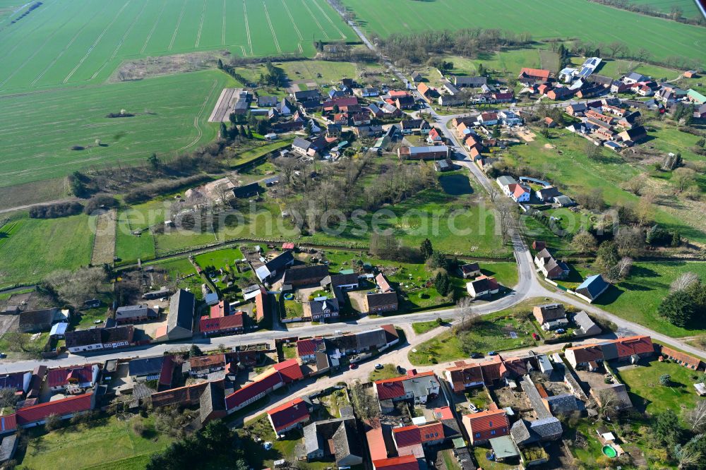 Krempendorf from above - Agricultural land and field boundaries surround the settlement area of the village in Krempendorf in the state Brandenburg, Germany