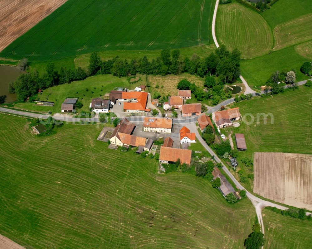 Kressenhof from the bird's eye view: Agricultural land and field boundaries surround the settlement area of the village in Kressenhof in the state Bavaria, Germany