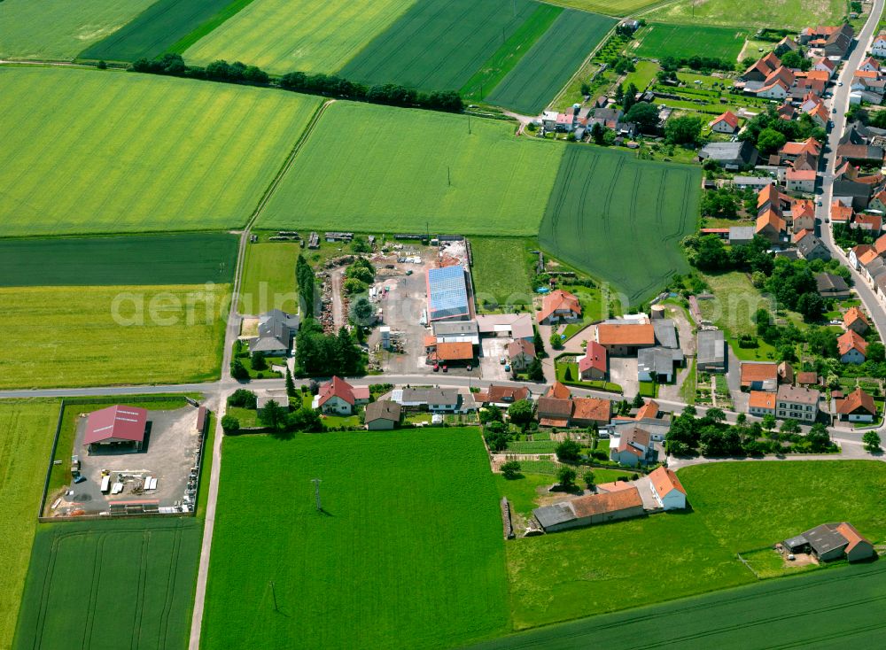 Aerial photograph Kriegsfeld - Agricultural land and field boundaries surround the settlement area of the village in Kriegsfeld in the state Rhineland-Palatinate, Germany