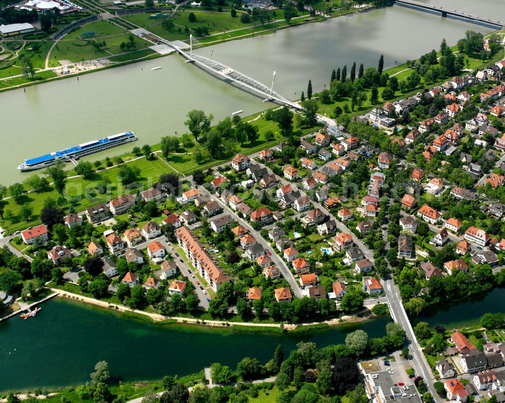 Kronenhof from above - Agricultural land and field boundaries surround the settlement area of the village in Kronenhof in the state Baden-Wuerttemberg, Germany