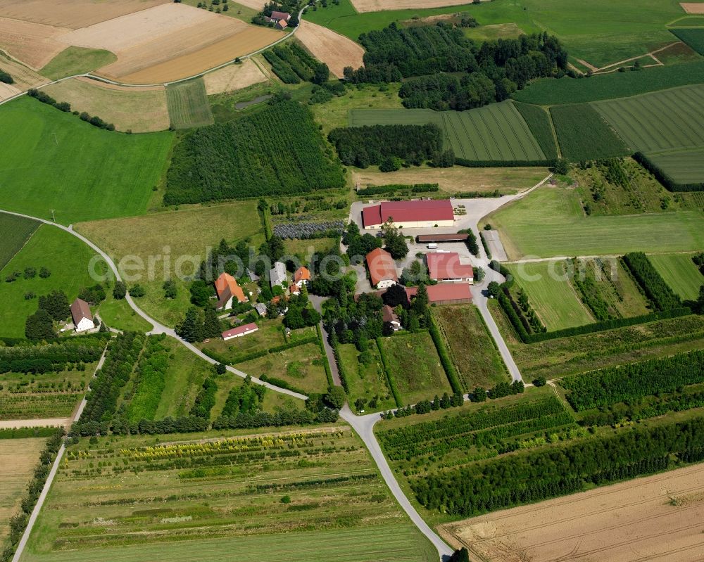 Krumbach from the bird's eye view: Agricultural land and field boundaries surround the settlement area of the village in Krumbach in the state Baden-Wuerttemberg, Germany