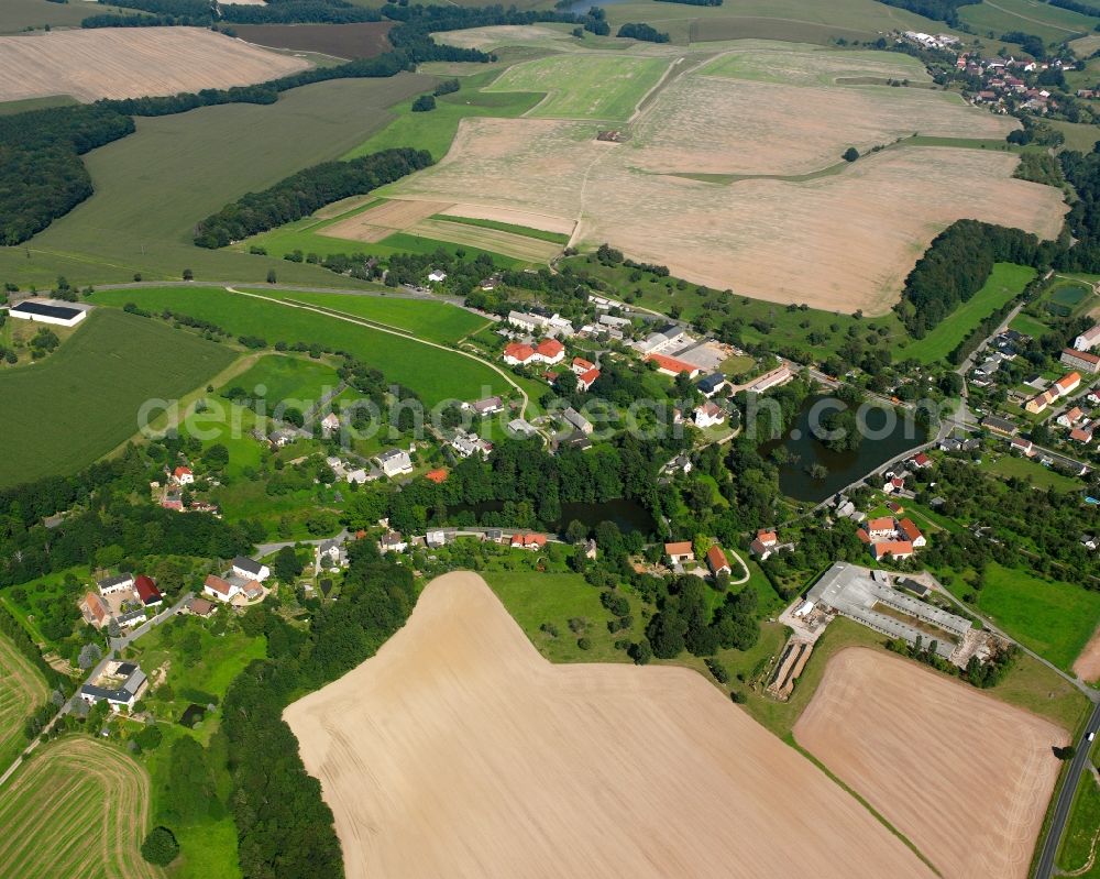 Aerial image Köttwitzsch - Agricultural land and field boundaries surround the settlement area of the village in Köttwitzsch in the state Saxony, Germany