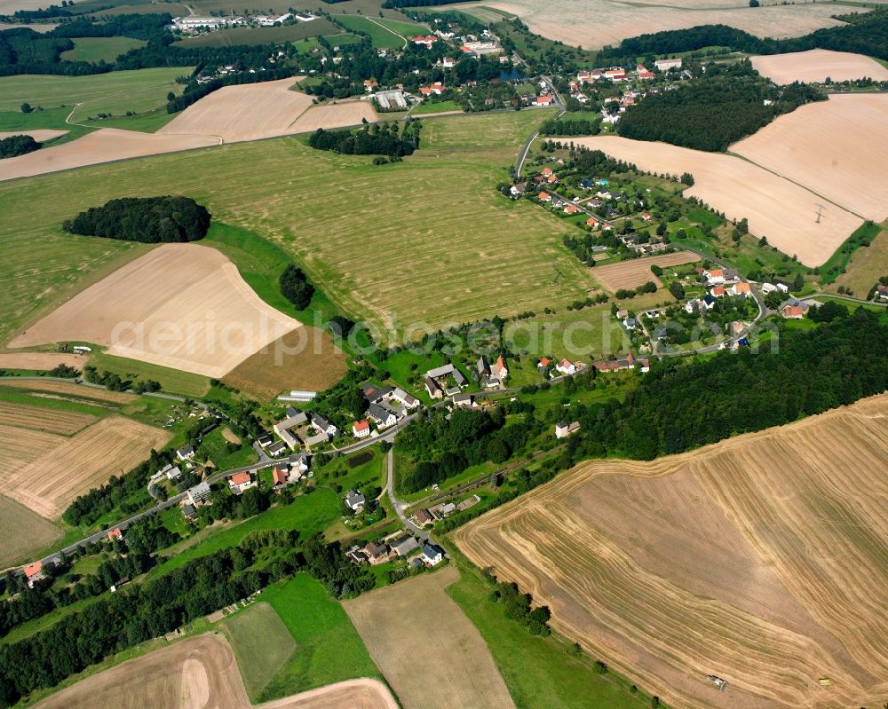 Köttwitzsch from above - Agricultural land and field boundaries surround the settlement area of the village in Köttwitzsch in the state Saxony, Germany