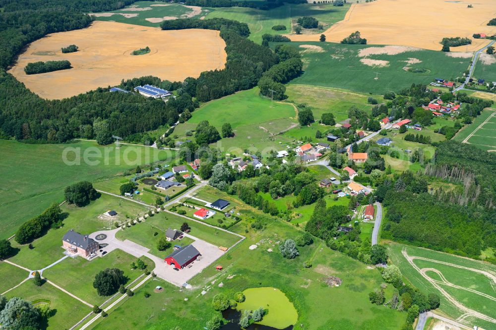 Aerial photograph Lalendorf - Agricultural land and field boundaries surround the settlement area of the village in Lalendorf in the state Mecklenburg - Western Pomerania, Germany