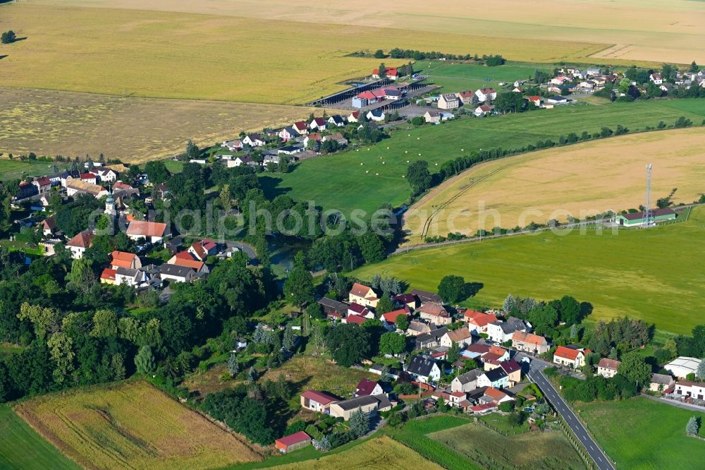 Aerial image Lampertswalde - Agricultural land and field boundaries surround the settlement area of the village in Lampertswalde in the state Saxony, Germany