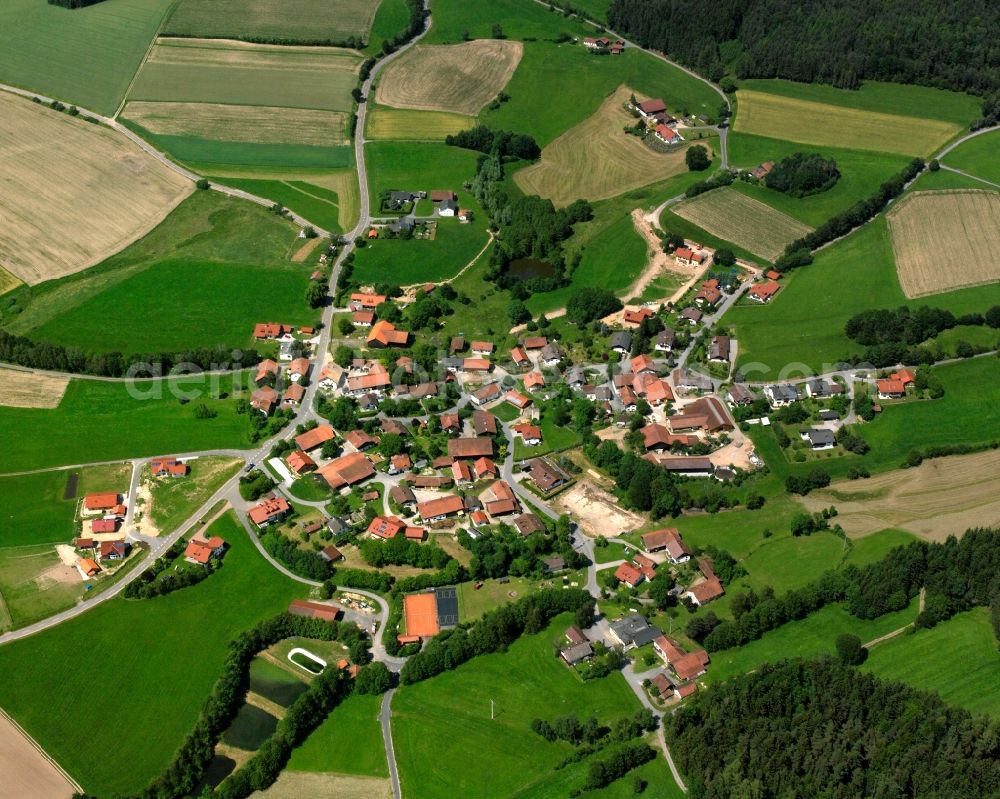 Landorf from above - Agricultural land and field boundaries surround the settlement area of the village in Landorf in the state Bavaria, Germany