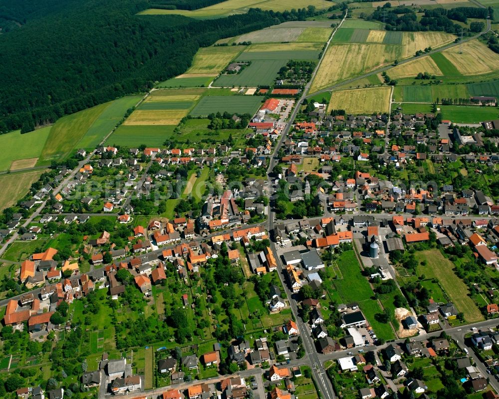 Aerial image Landwehrhagen - Agricultural land and field boundaries surround the settlement area of the village in Landwehrhagen in the state Lower Saxony, Germany