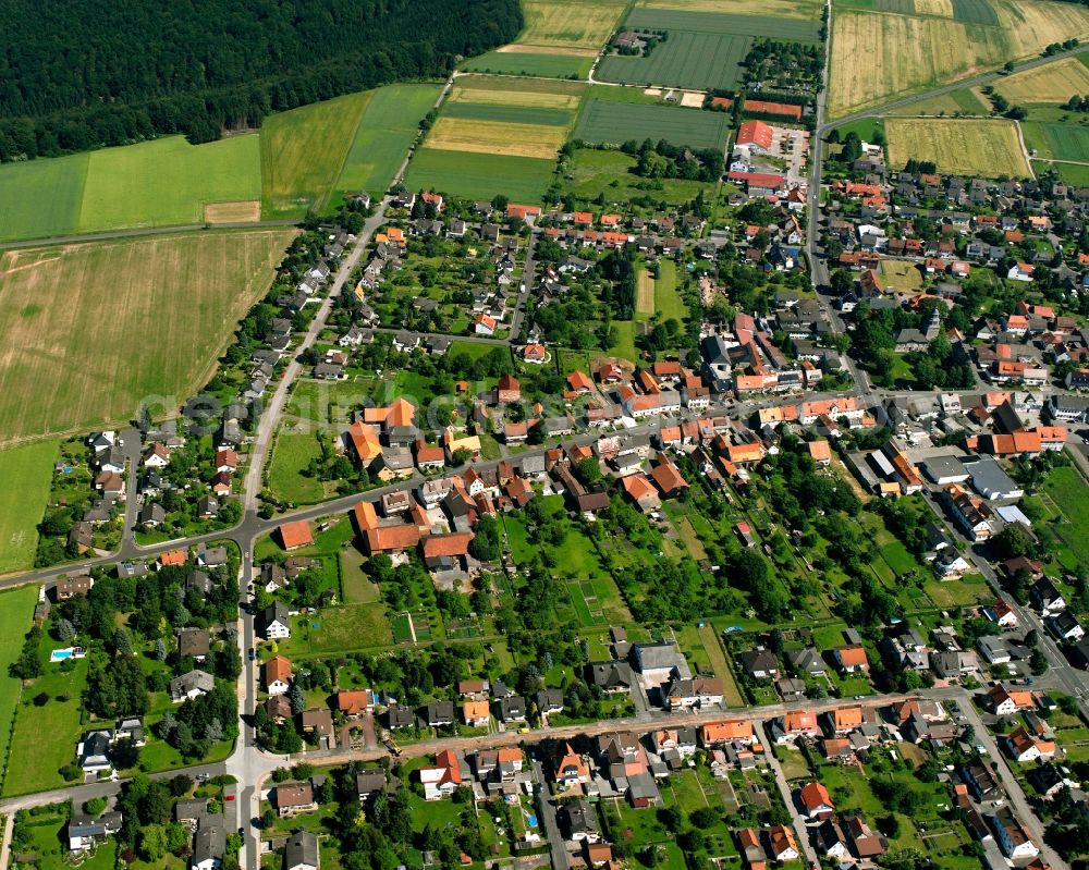 Aerial photograph Landwehrhagen - Agricultural land and field boundaries surround the settlement area of the village in Landwehrhagen in the state Lower Saxony, Germany