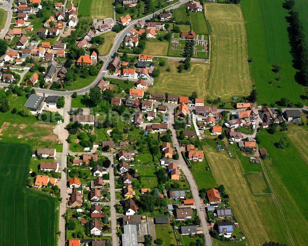 Langenbrand from above - Agricultural land and field boundaries surround the settlement area of the village in Langenbrand in the state Baden-Wuerttemberg, Germany